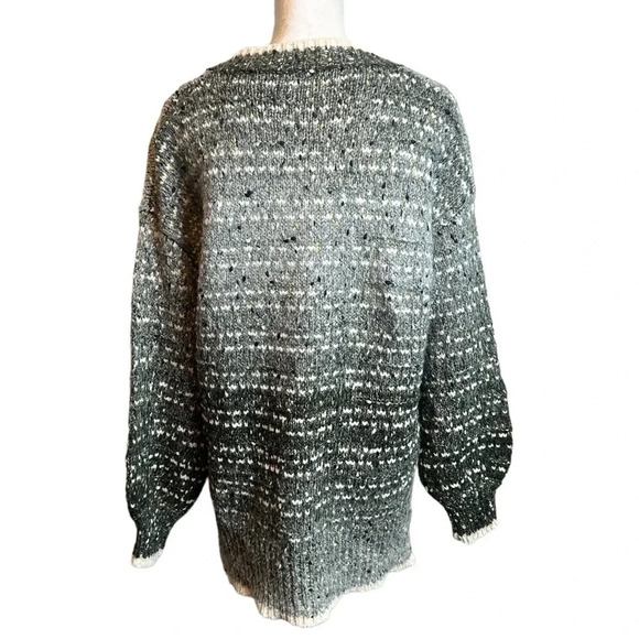 GEEGEE woman’s v-neck, knit sweater.
Size: Medium
back - Picture 4 of 8
